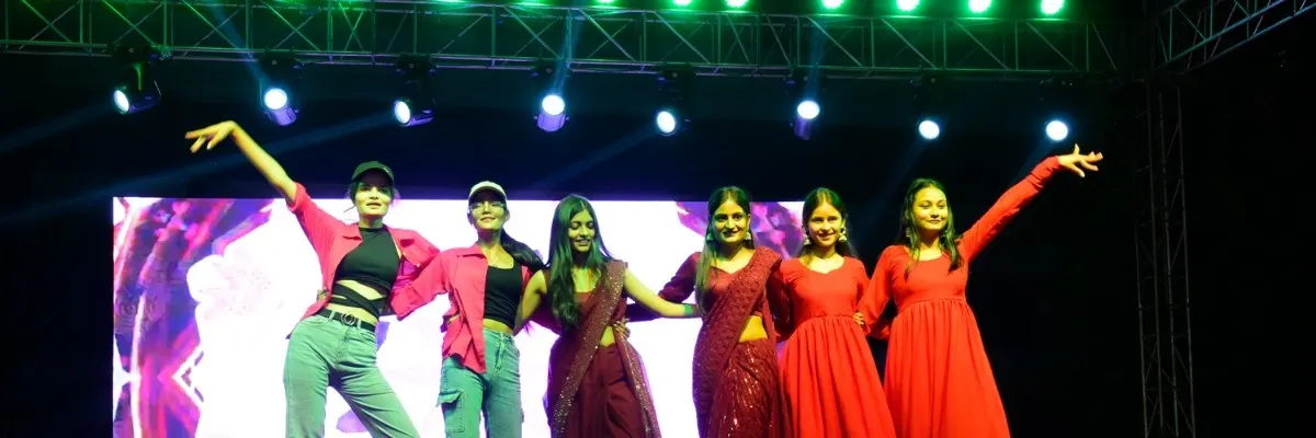 Students performing a dynamic dance on stage at Ambalika Institute Annual Event – Best Engineering College in Lucknow UP